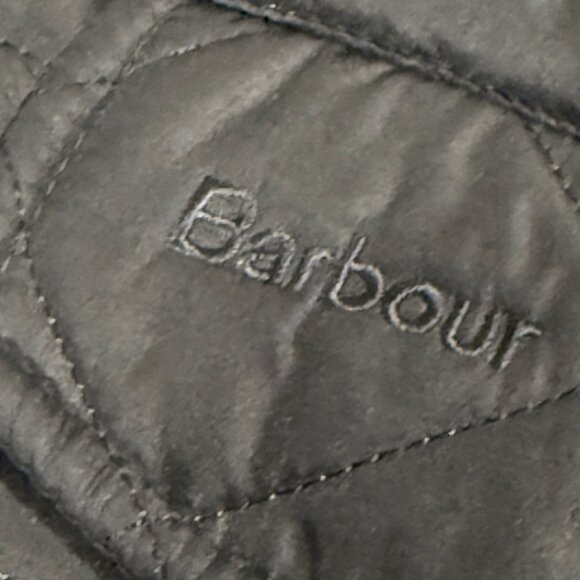Barbour Quilted Jacket - blends outdoor functionality with a refined look. - Picture 1 of 10